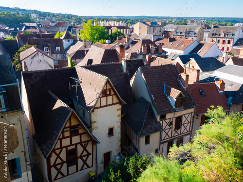 Townscape of Montlucon with view of old-fashioned half timbered buildings.