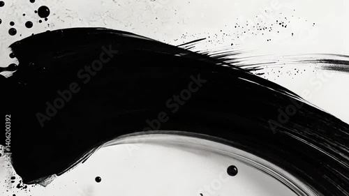 Bold Black Paint Stroke with Splashes on White Background