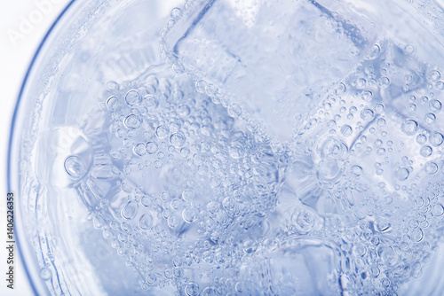 Top view of soda water with ice in glass
