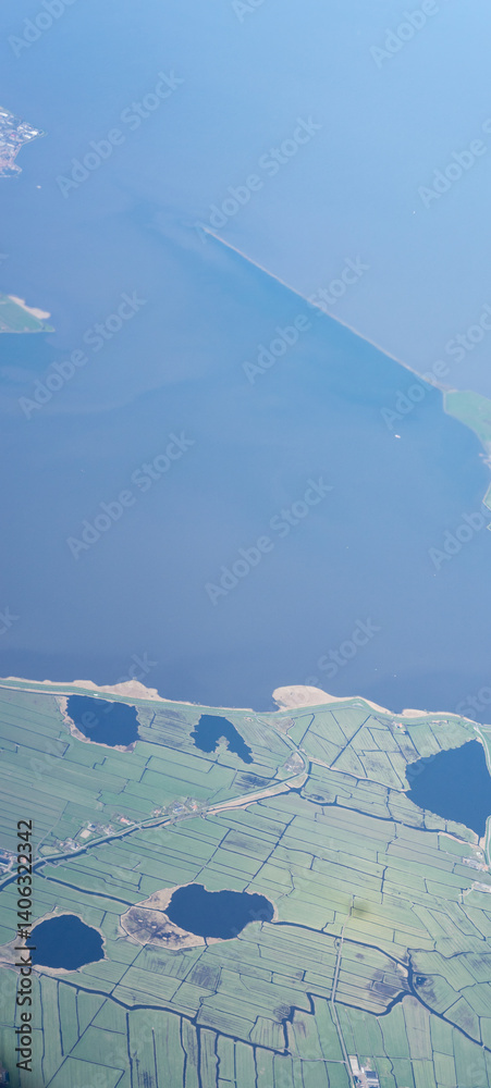 Netherlands, Holland, Dutch, Aerial view of city outskirts in the day from an aeroplane window