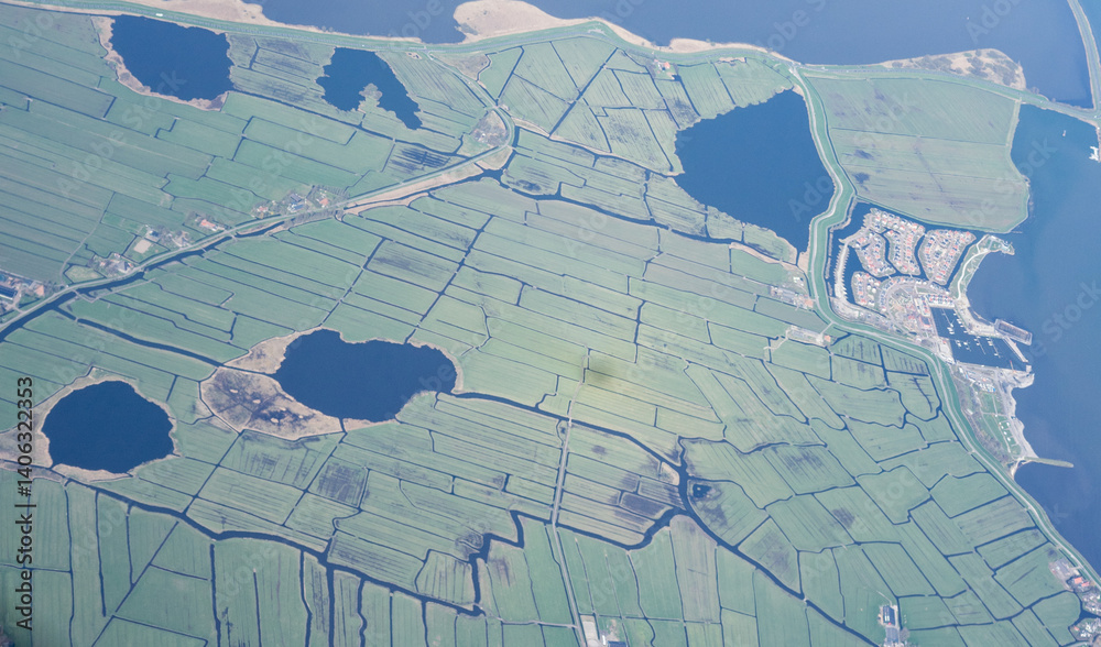 Netherlands, Holland, Dutch, Aerial view of city outskirts in the day from an aeroplane window