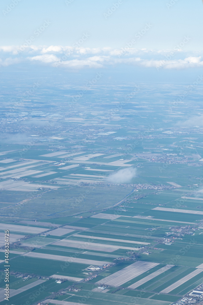 Netherlands, Holland, Dutch, Aerial view of city outskirts in the day from an aeroplane window