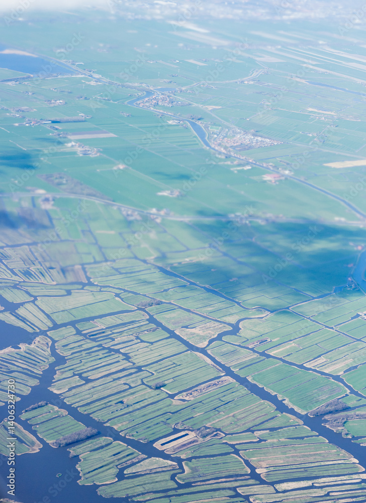 Netherlands, Holland, Dutch, Aerial view of city outskirts in the day from an aeroplane window