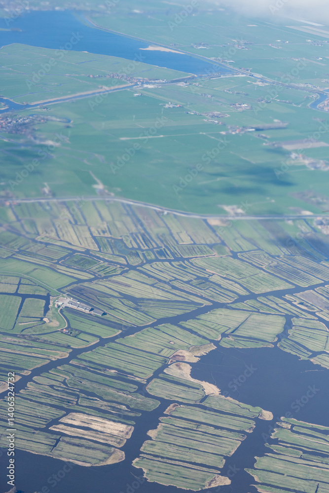Netherlands, Holland, Dutch, Aerial view of city outskirts in the day from an aeroplane window