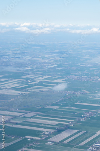 Obraz na płótnie Netherlands, Holland, Dutch, Aerial view of city outskirts in the day from an aeroplane window w salonie