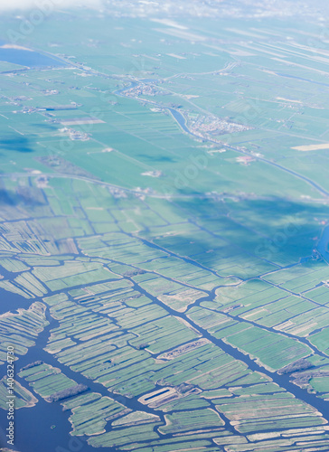 Obraz na płótnie Netherlands, Holland, Dutch, Aerial view of city outskirts in the day from an aeroplane window w salonie