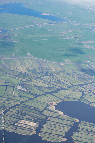 Obraz na płótnie Netherlands, Holland, Dutch, Aerial view of city outskirts in the day from an aeroplane window w salonie