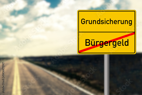 Eine Landstrasse und Ortstafel Ende Bürgergeld Anfang Grundsicherung