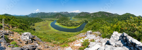 Obraz na płótnie River Rijeka Crnojevića (River of Crnojević) flowing in the mountains near the Lake Skadar in Montenegro, as seen from the opposite bank of the Pavlova Strana viewpoint w salonie