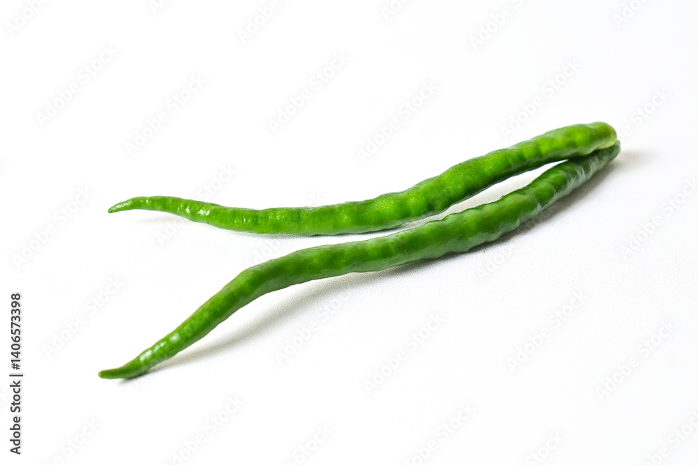 Close up view of two (2) fresh green chili peppers isolated on white background. Clipping path. Close up view of two (2) fresh green chili peppers isolated on white background. Clipping path.