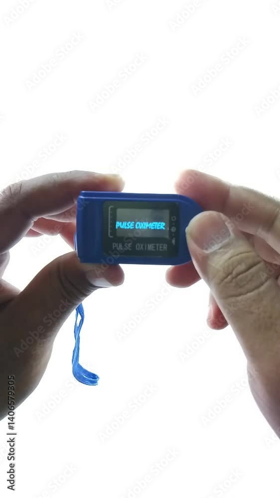 Pulse Oximeter portable digital device to measure person's oxygen saturation. Reduction in oxygenation is an emergency sign of pneumonia requiring urgent hospitalization. white background Pulse Oximeter portable digital device to measure person's oxygen saturation. Reduction in oxygenation is an emergency sign of pneumonia requiring urgent hospitalization. white background