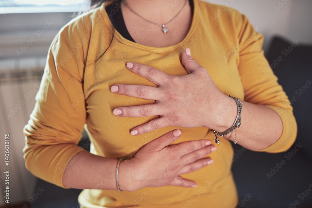 Woman with strong stomach ache, menstrual and digestive issues at home.