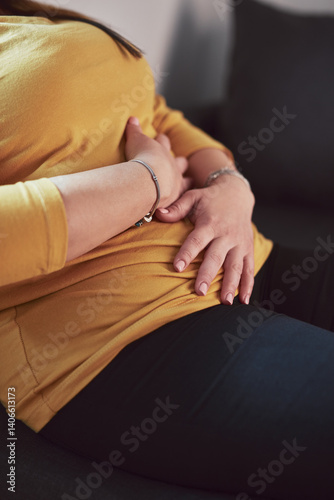 Obraz na płótnie Woman with strong stomach ache, menstrual and digestive issues at home. w salonie