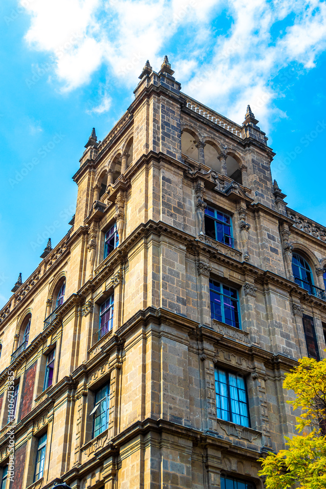 Fototapeta premium Old historical buildings house church cathedral construction in Mexico City.