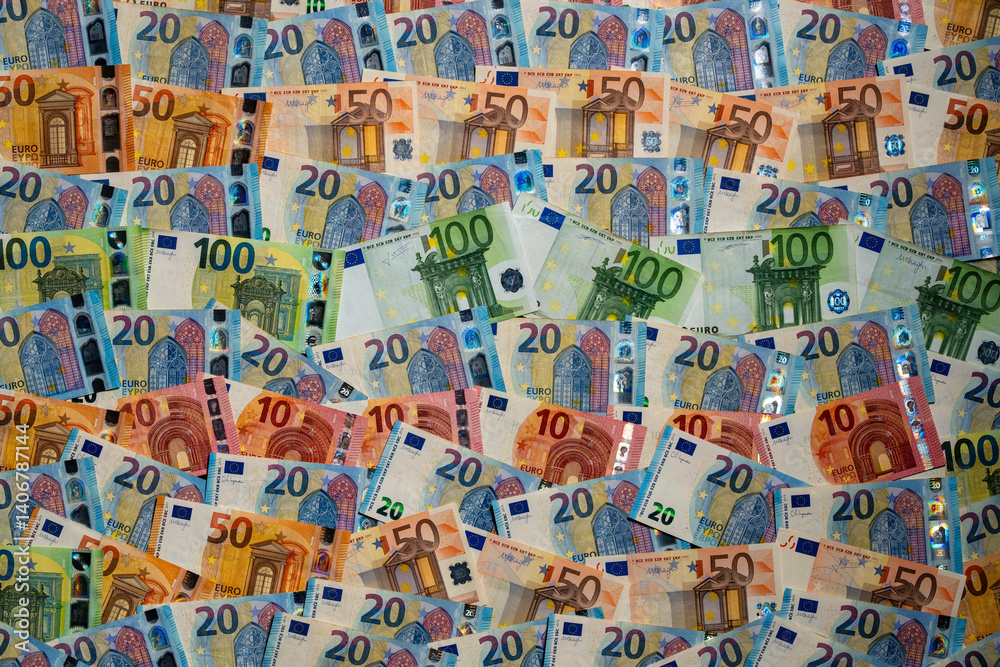 Fototapeta premium Different of Euro banknotes money. European paper money currency as part of global financial and trading system. Background of colored Euro bills. Business, finances, cash and money saving concept