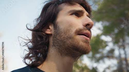 Long Haired Man Talks Suspiciously With Distrustful Passers-by in the Park