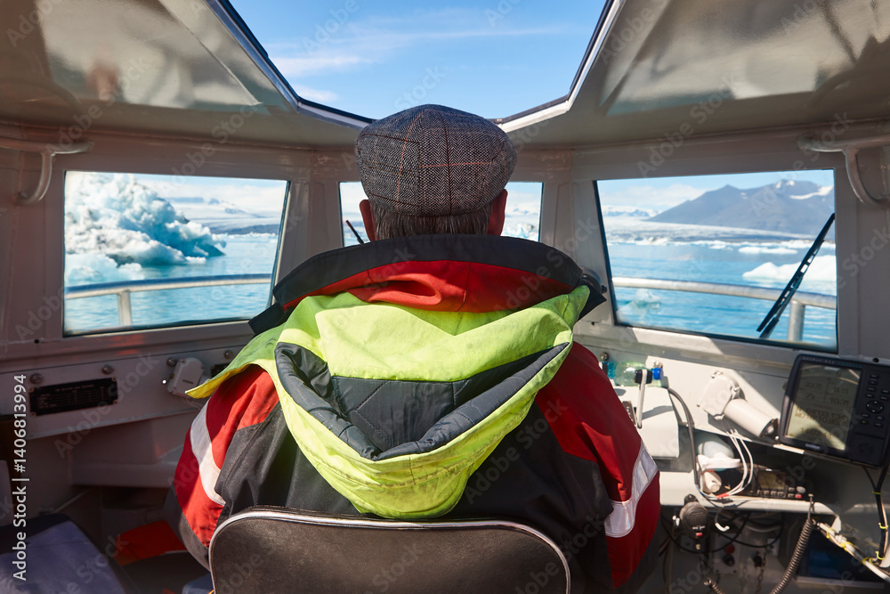 Senior driver in an amphibious vehicle. Jokulsarlon, Southeast area. Iceland.