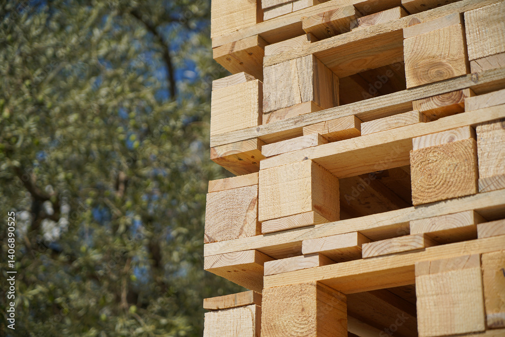 Stacked Wooden Pallets Outdoors in Sunshine for Industrial or Storage Use