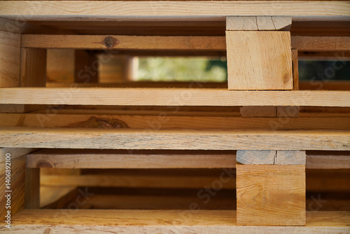Stacked Wooden Pallets in an Outdoor Environment Highlighting Natural Textures
