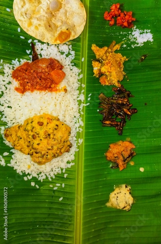 a traditional South Indian meal served on a banana leaf