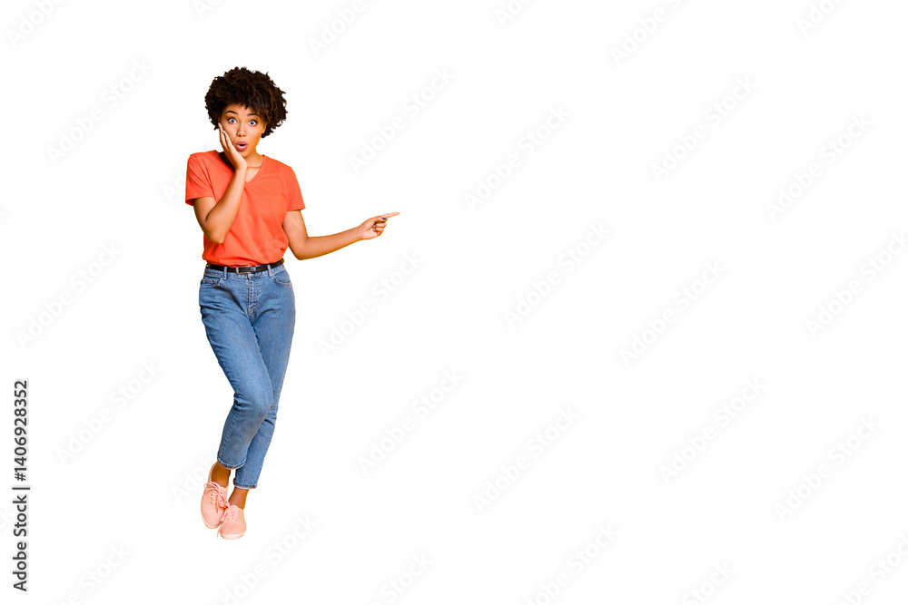 Full length body size copyspace photo of shocked stylish trendy pretty sweet cute lovely black woman wearing jeans denim t-shirt pointing at emptiness isolated over yellow vivid color background Full length body size copyspace photo of shocked stylish trendy pretty sweet cute lovely black woman wearing jeans denim t-shirt pointing at emptiness isolated over yellow vivid color background