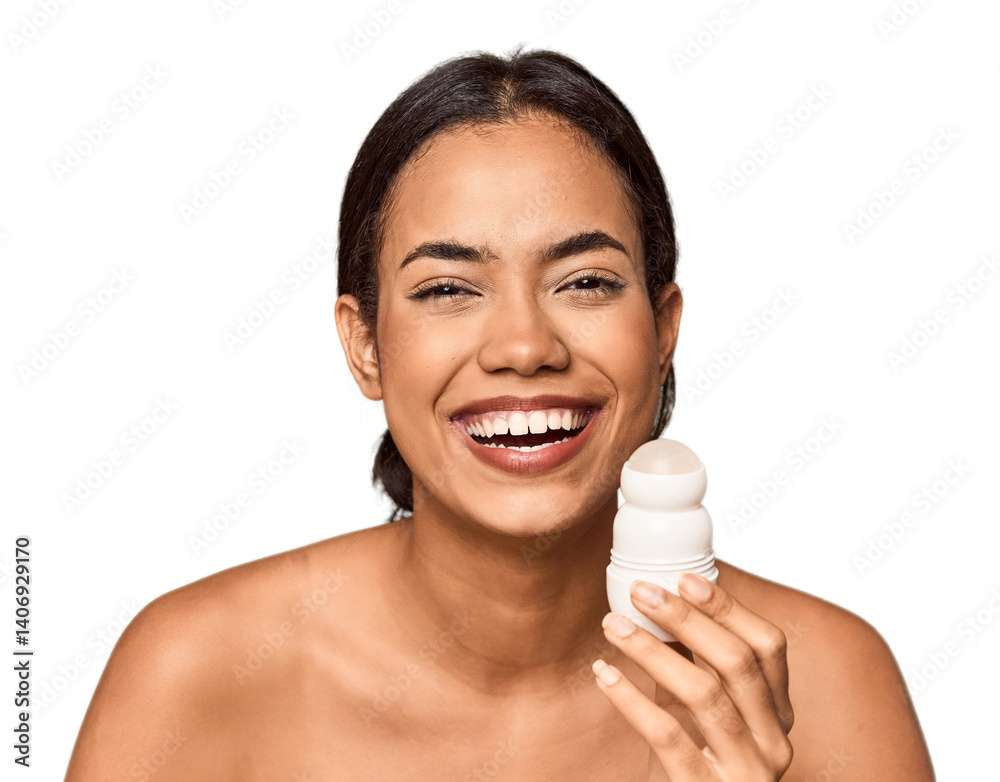 Filipino woman holds deodorant in studio laughing and having fun. Filipino woman holds deodorant in studio laughing and having fun.