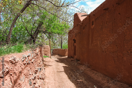 old alley, village road, clay alley, Quiet alley in a historic village, Ancient street in old Persian town, Abyaneh, Peaceful alley, Green Path, the ruins of the ancient fortress, the great wall