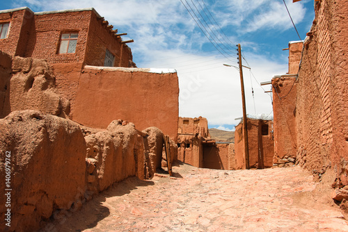 Ancient village, Peaceful alley, Village road, Abyaneh village, Cloudy sky, Narrow alley leading to a blue sky, houses in the village of Abyanhe, houses in the village, the old town, Persian, Iran