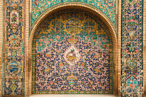 mosaic facade, decorative arch design, Persian tile arch, Colorful arches of Golestan Palace​, Mosaic patterns facade, Traditional Iranian arch design, Historical arch designs of Iran