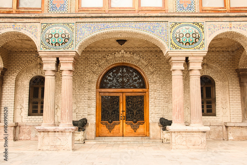 Persian royal architecture, Golestan Palace facade, Traditional Persian arches and columns, Historic facade of Golestan Palace, Royal architecture with open arches, Stone columns and Persian tilework