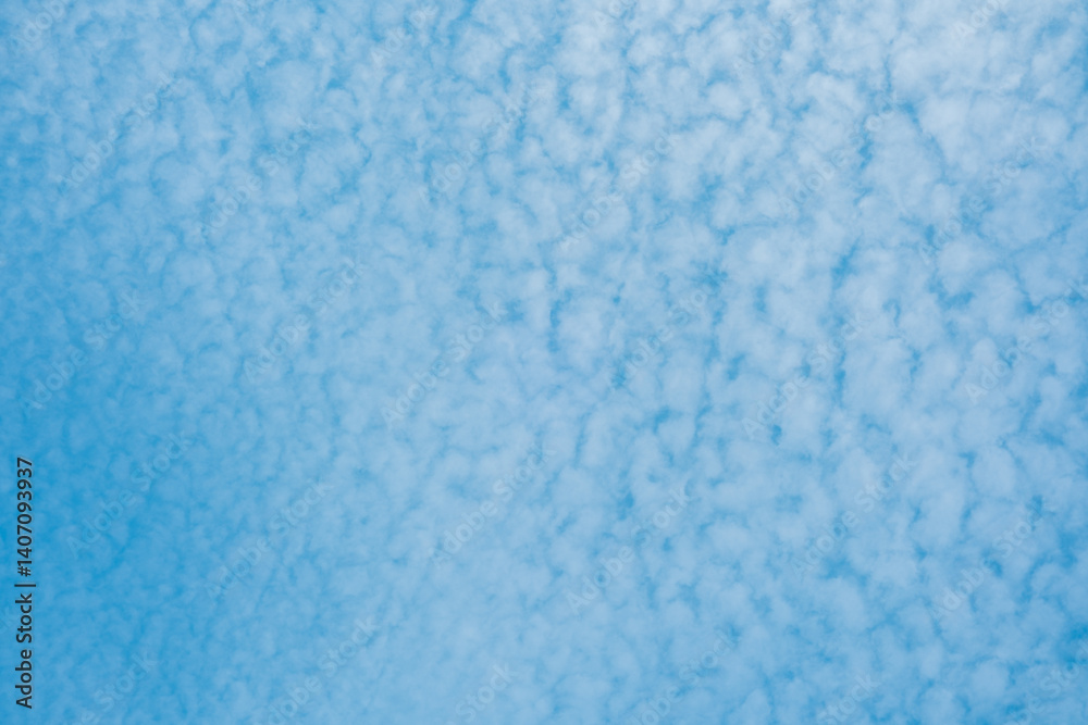 Beautiful cloud patterns fill the sky on a clear sunny day Beautiful cloud patterns fill the sky on a clear sunny day