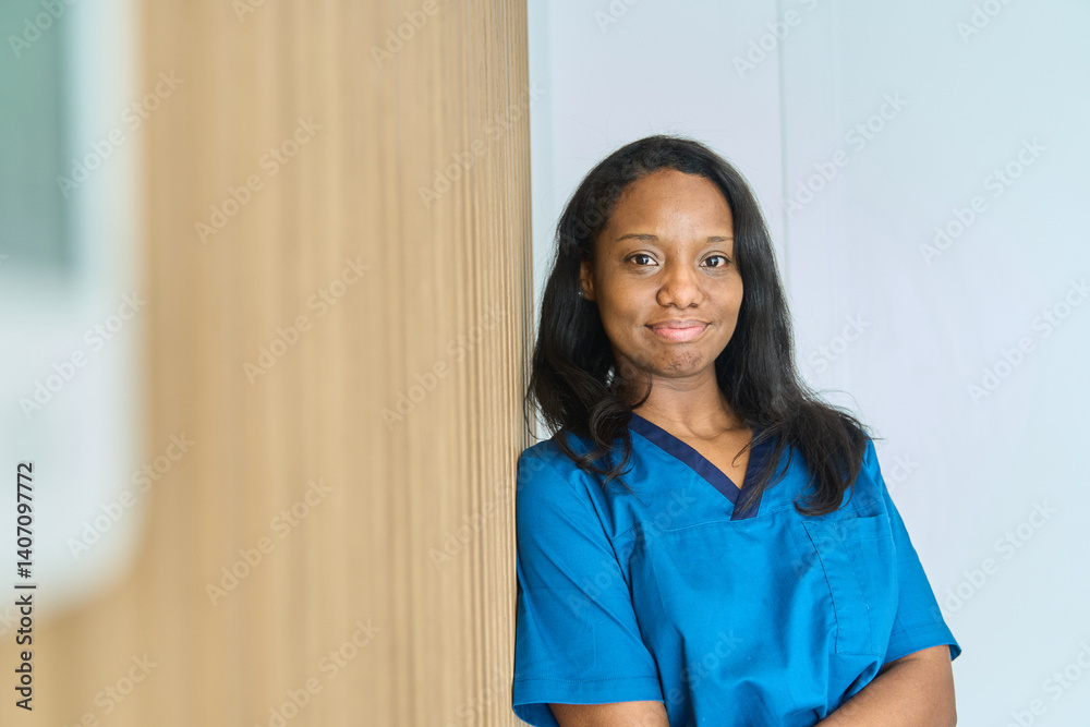 Confident dentist smiling in modern dental clinic Confident dentist smiling in modern dental clinic