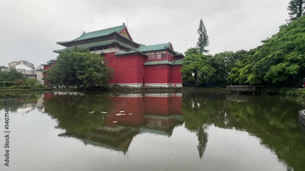 National Museum of History building in Taipei Botanical Garden Taiwan city nature park trees and pond rainy day National Museum of History building in Taipei Botanical Garden Taiwan city nature park trees and pond rainy day