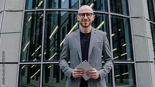 The Confident Businessman with Tablet