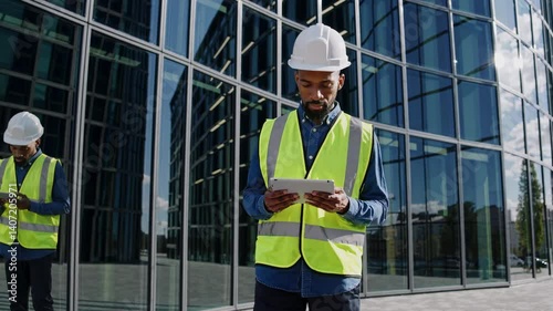 The Worker with Tablet Outdoors