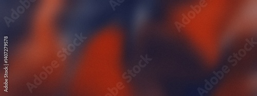 Abstract blurred texture with dark blue and warm red tones, noise effect