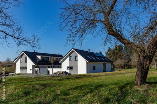 Obraz na płótnie Modern rural house in a European village w salonie