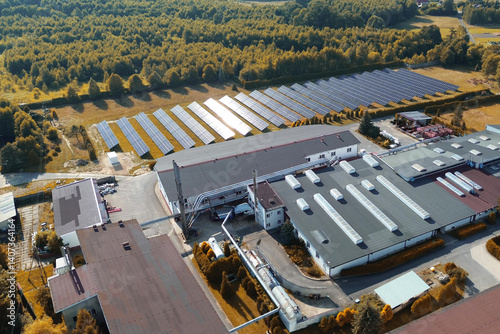 Solar energy panels installed in green landscape.