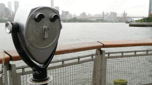 New York City waterfront skyline, Manhattan Midtown buildings, riverfront skyscrapers by East river. Waterside cityscape, tower viewer, Gantry Plaza. Long Island, Queens. United States tourism. Rainy.