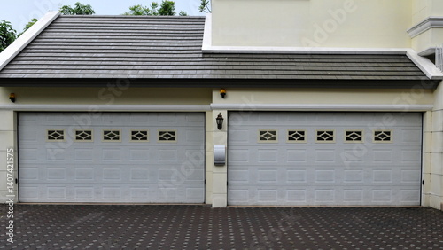 Exterior view of a generic double garage on a street