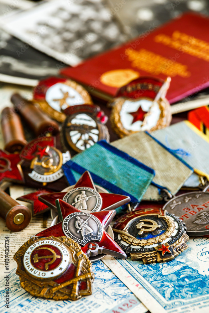 Fototapeta premium Awards of the Second world war close-up. Soviet military awards - Order Red Banner, Glory,the order of the Patriotic war,Order of the Red Star, Medal for Courage, Medal Battle Merit.