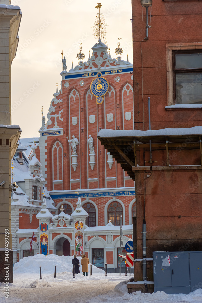 Riga, Latvia, 2 December 2023: Snowy streets of Riga historic center in winter