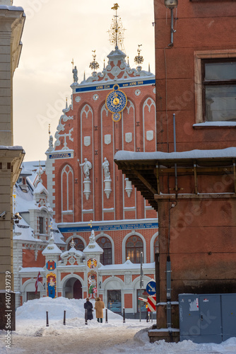 Obraz na płótnie Riga, Latvia, 2 December 2023: Snowy streets of Riga historic center in winter w salonie