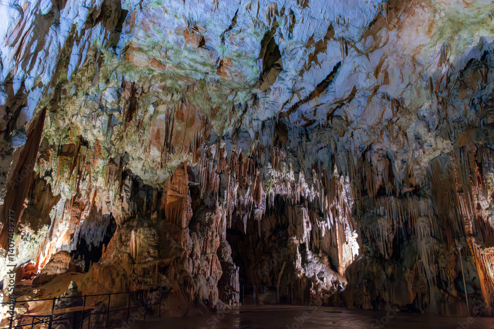 Exploring beautiful Postojna cave in Slovenia the most visited european cave. Thousands of stalagmites and stalactites
