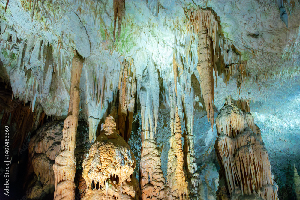 Exploring beautiful Postojna cave in Slovenia the most visited european cave. Thousands of stalagmites and stalactites