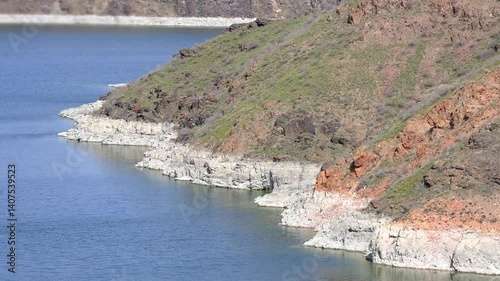 The rocks and shoreline show how the water in the lake has fallen.