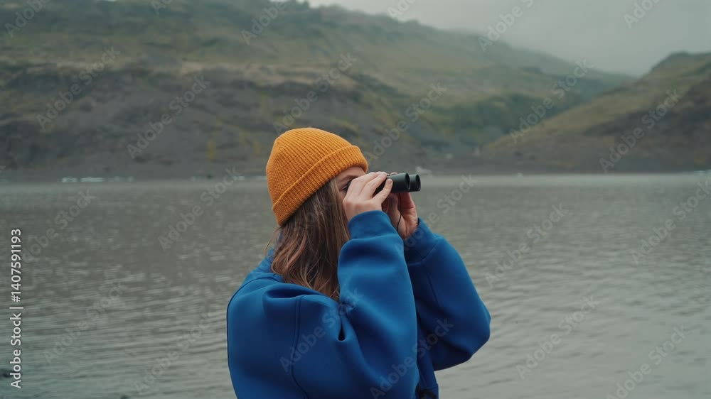  Young Woman Observing Icelandic Volcanic Landscapes Through Binoculars | 4K Travel Scene