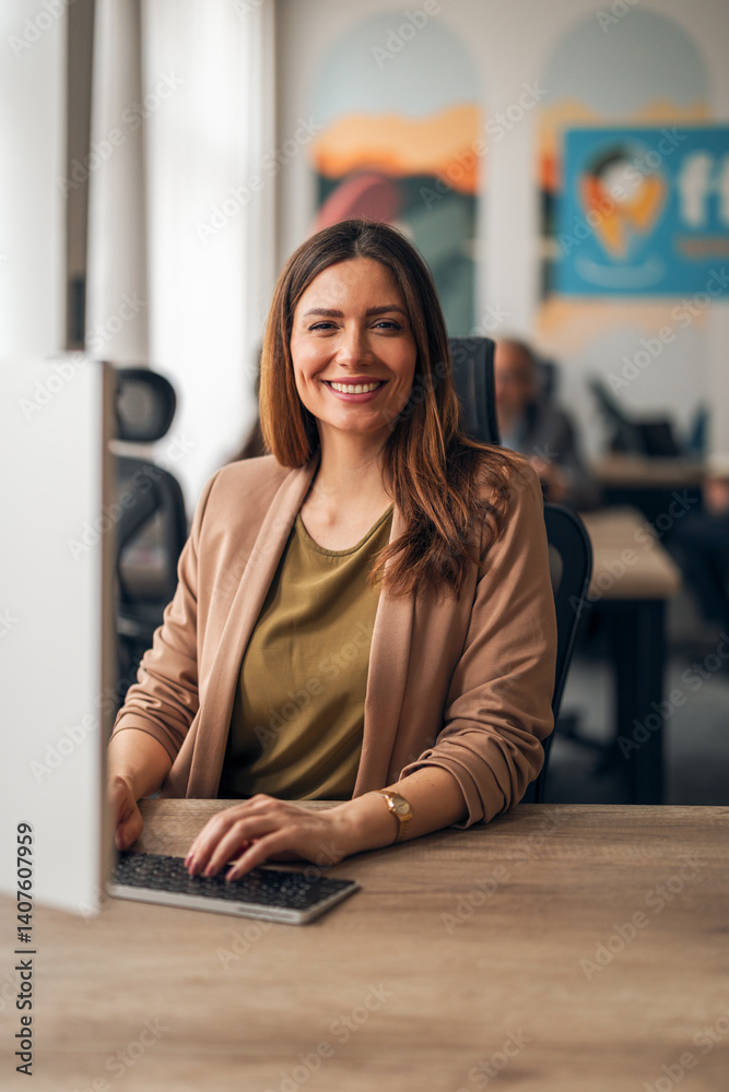 Smiling Businesswoman Working in a Modern Office Environment