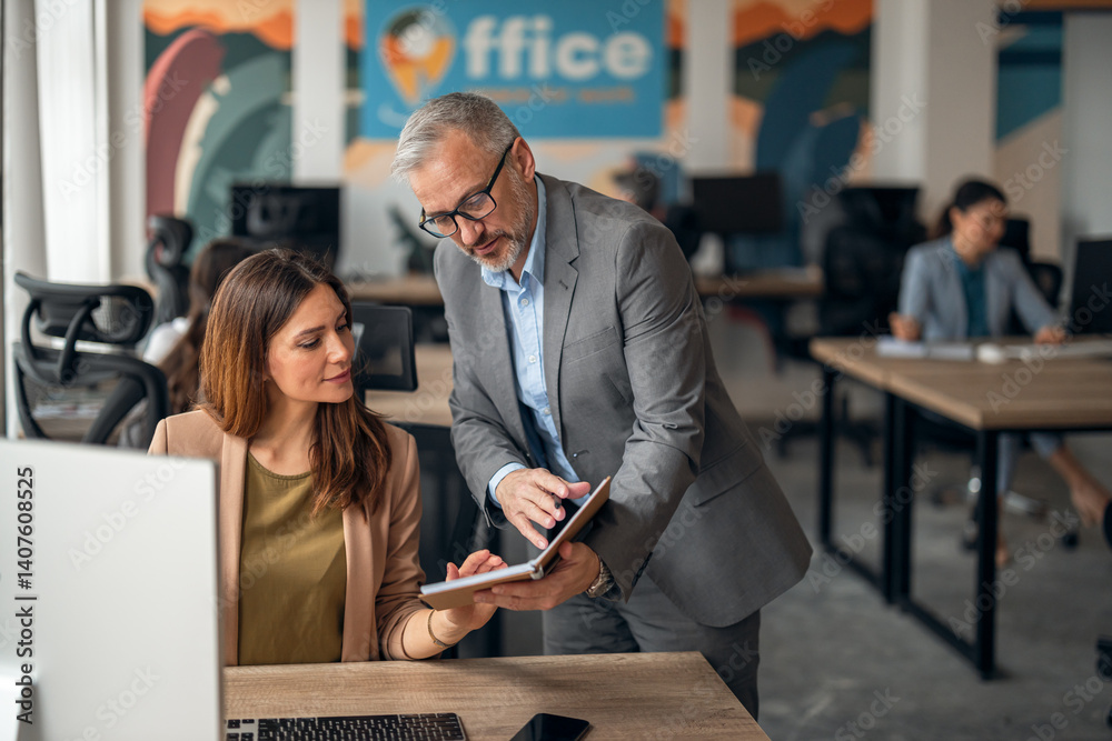 Professional Team Collaboration in a Modern Office Setting with Digital Devices