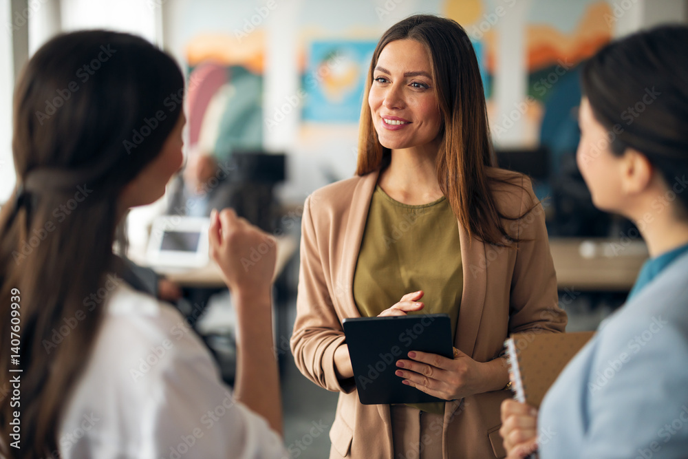 Professional Women Collaborating in a Modern Office Environment